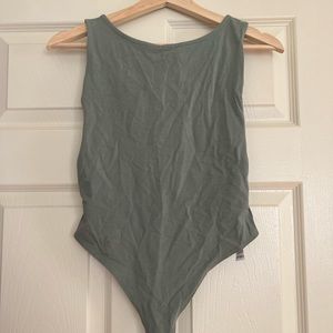 Side plunge body suit- gently used.